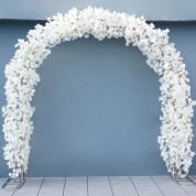 Linens And Simple Flowers On Tables