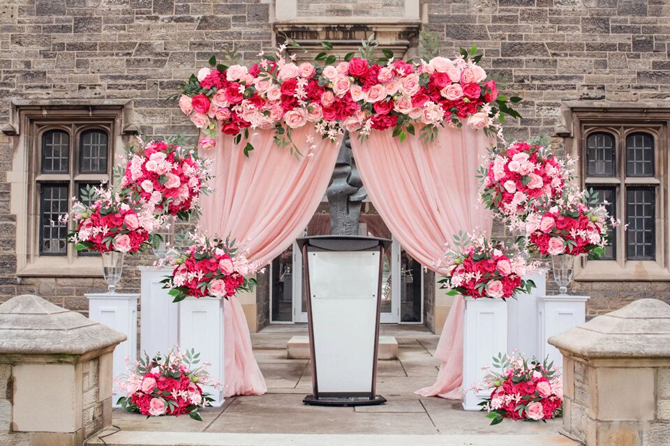 Gather the necessary materials for draping a fabric on a round wedding arch.