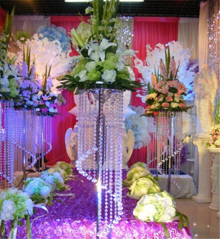 flower arrangements in copper pitcher