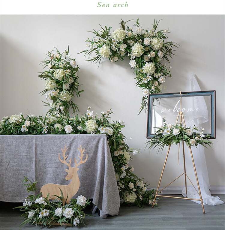 hanging greenery on wedding arch