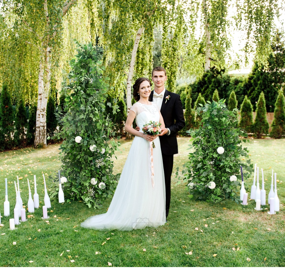 table centerpieces with candles and flowers