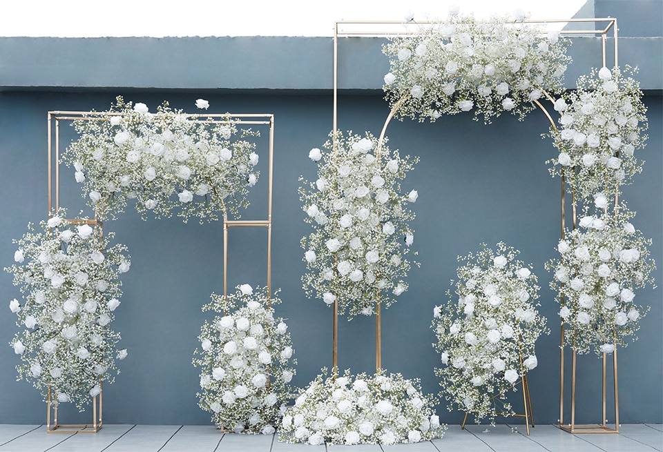 flower arrangements in a snowman vase